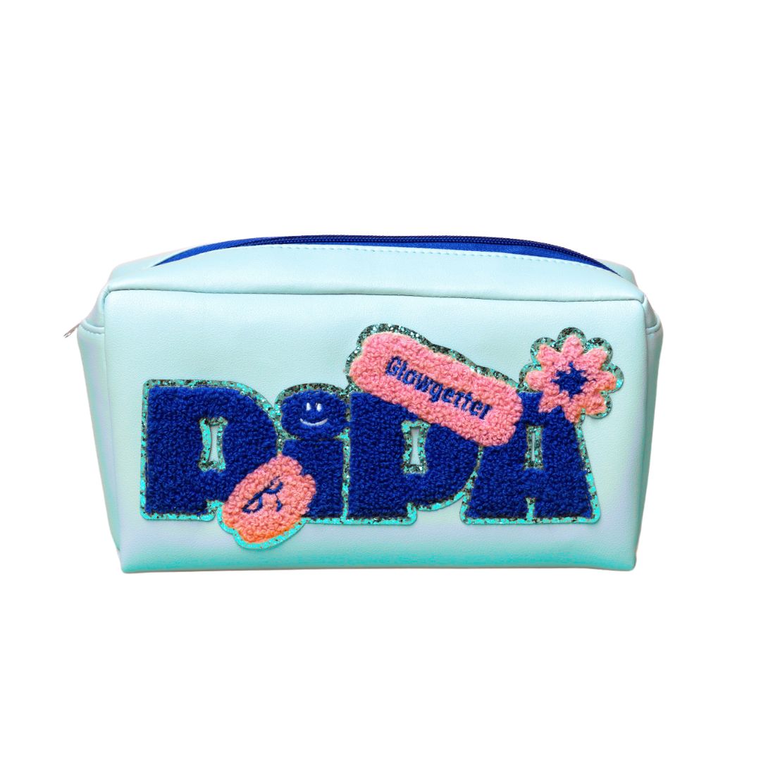 Pipa Pouch with gold glitter chenille patches for organizing skincare.