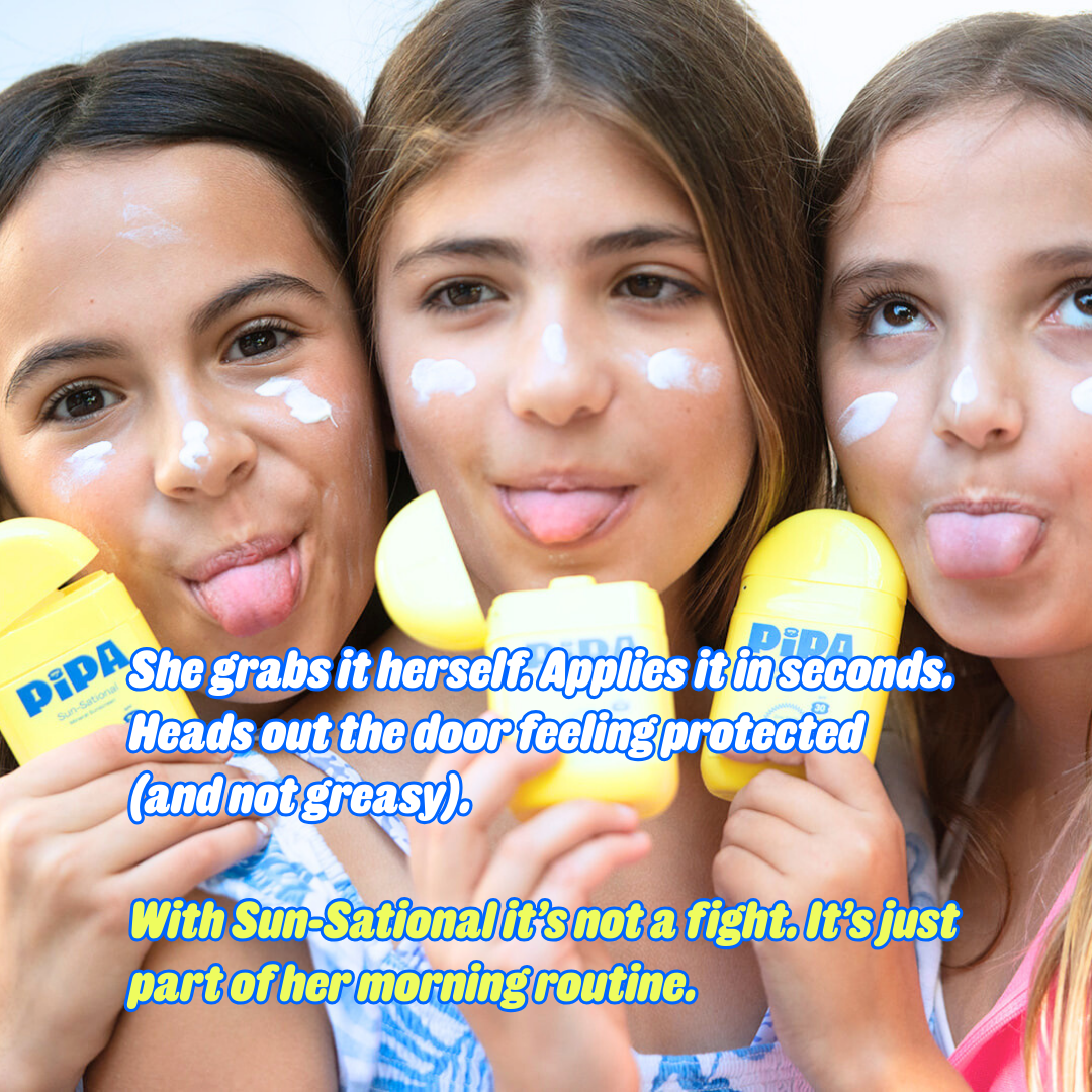 Young girls applying Sun-Sational mineral sunscreen and smiling outdoors.
