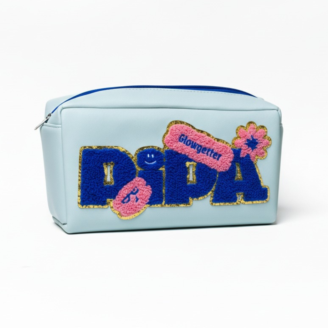 Light blue Pipa Pouch with gold glitter chenille patches and zipper for skincare organization